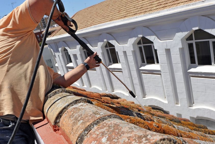 Roofer Maintaining a Roof